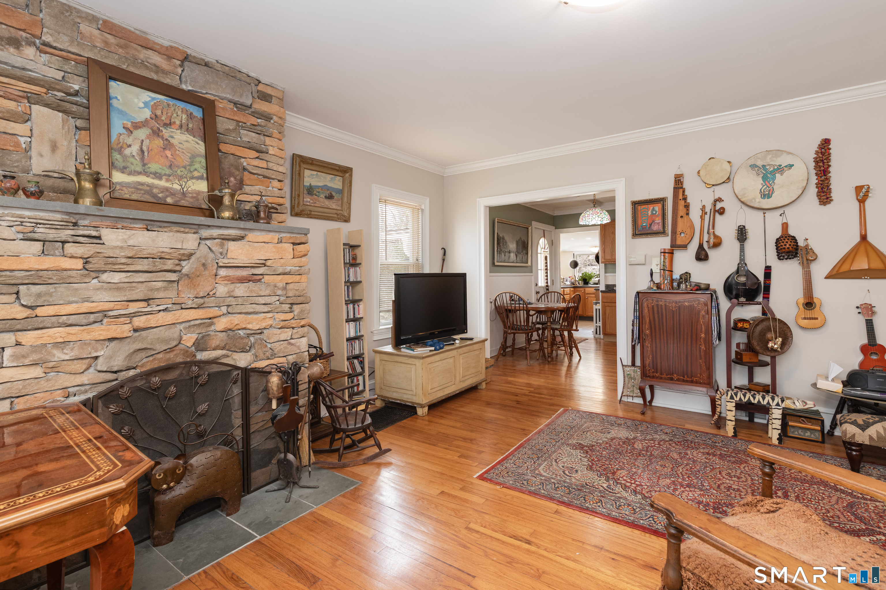 14 Laurel Trail Newtown, CT 06482 - Photo 8 of 39 a living room with furniture and wooden floor
