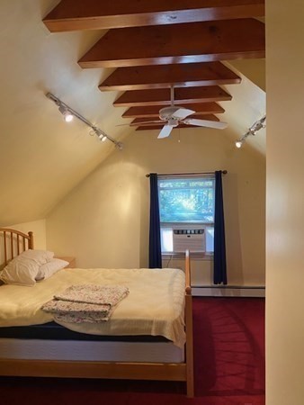 20 Walnut Road Boston, MA 02132 - Photo 26 of 34 a bedroom with a bed a window and dresser