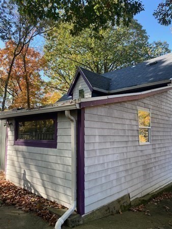 20 Walnut Road Boston, MA 02132 - Photo 5 of 34 a front view of a house with a yard