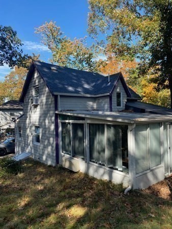 20 Walnut Road Boston, MA 02132 - Photo 9 of 34 a front view of a house with a yard