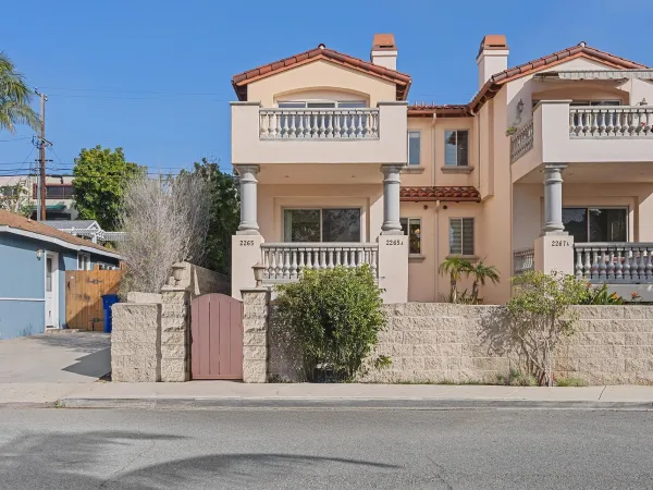 front view of a house with a garden