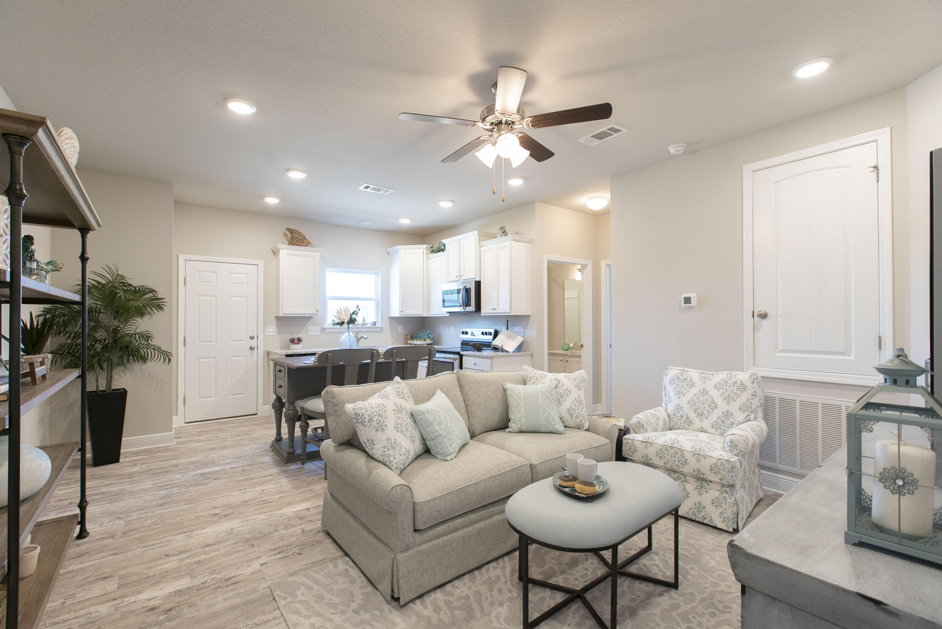 238 Stonegate Circle, Unit 33 Santa Rosa Beach, FL 32459 - Photo 4 of 26 a living room with furniture and a view of kitchen