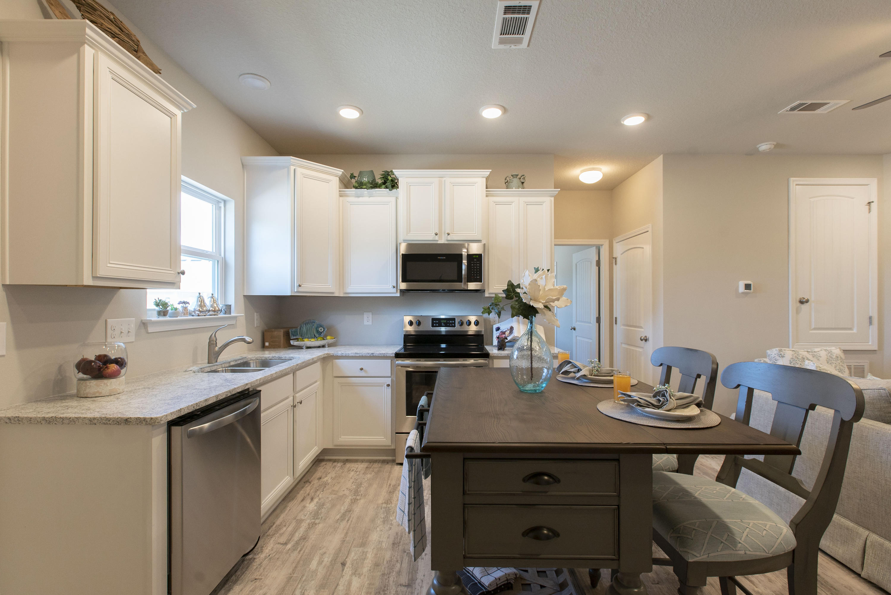 238 Stonegate Circle, Unit 33 Santa Rosa Beach, FL 32459 - Photo 5 of 26 a kitchen with a sink stove and microwave