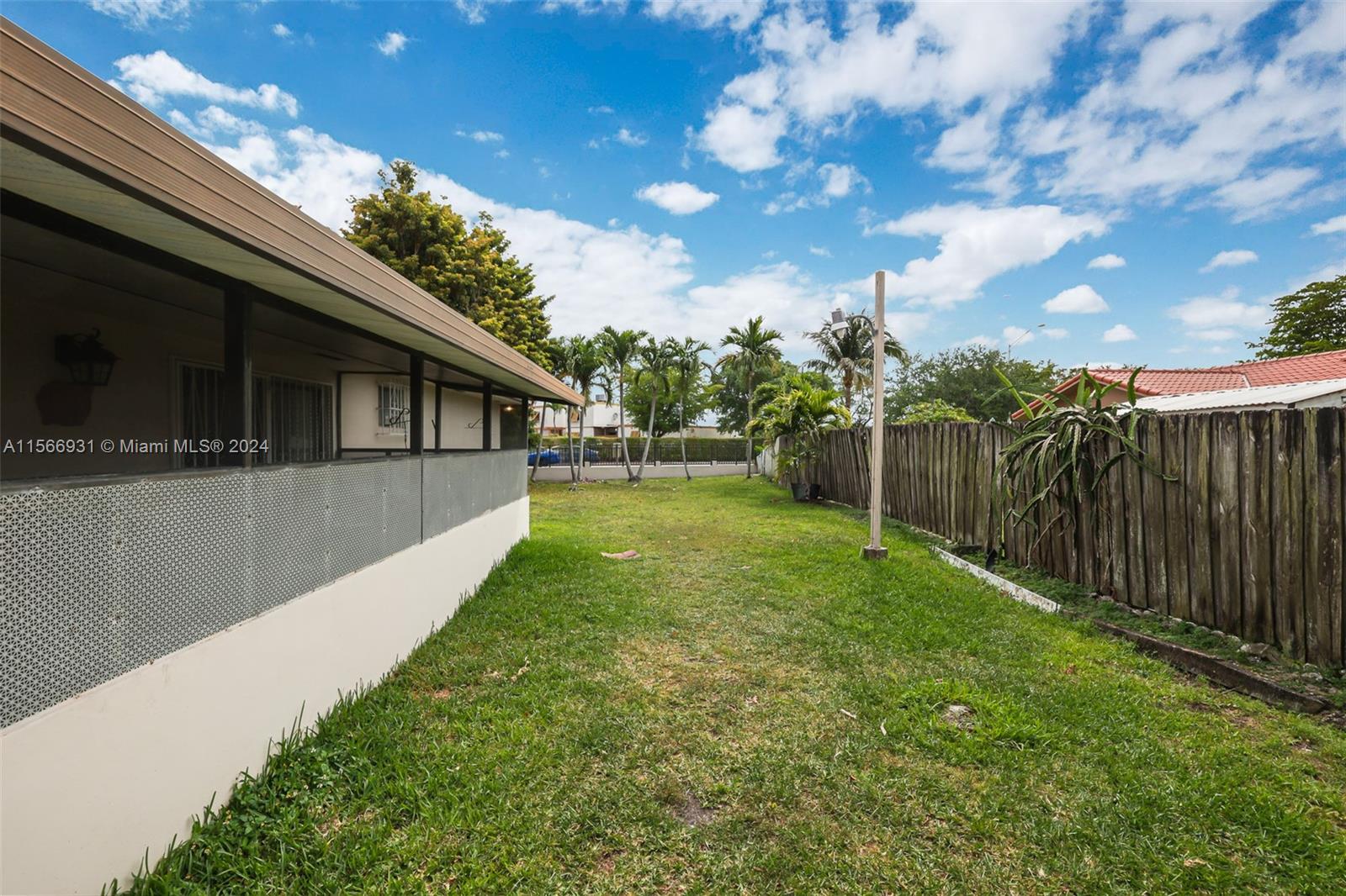 13202 Southwest 12th Lane Miami, FL 33184 - Photo 35 of 47 a view of a backyard with green space
