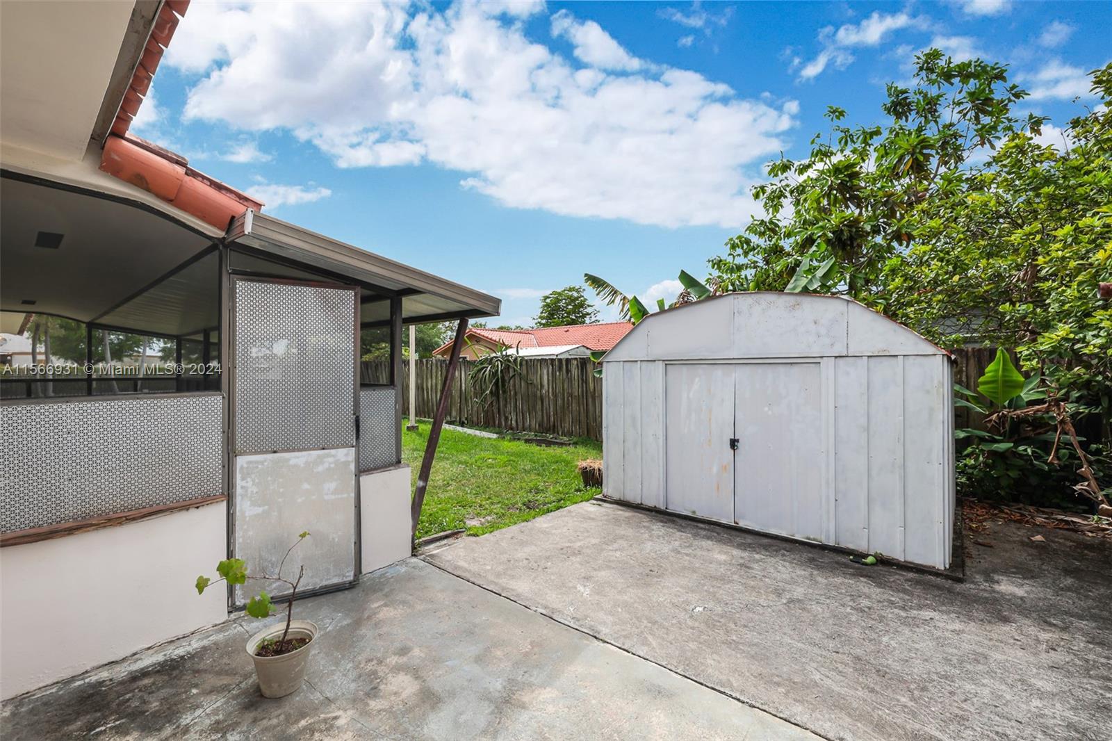 13202 Southwest 12th Lane Miami, FL 33184 - Photo 36 of 47 a view of backyard with potted plants