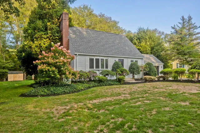 a house view with a garden space