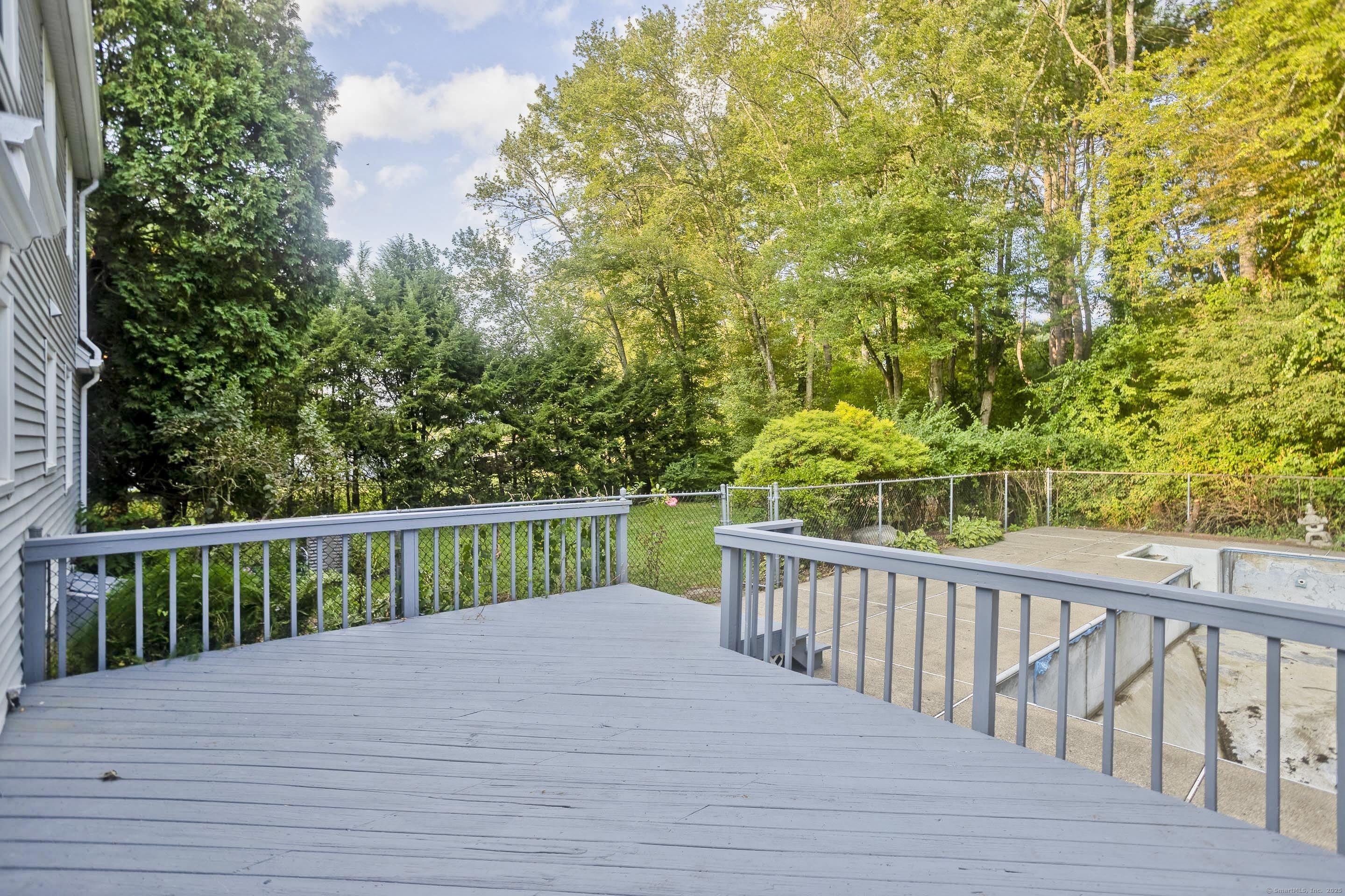 215 Sand Dam Road Thompson, CT 06277 - Photo 28 of 36 a view of a wooden deck