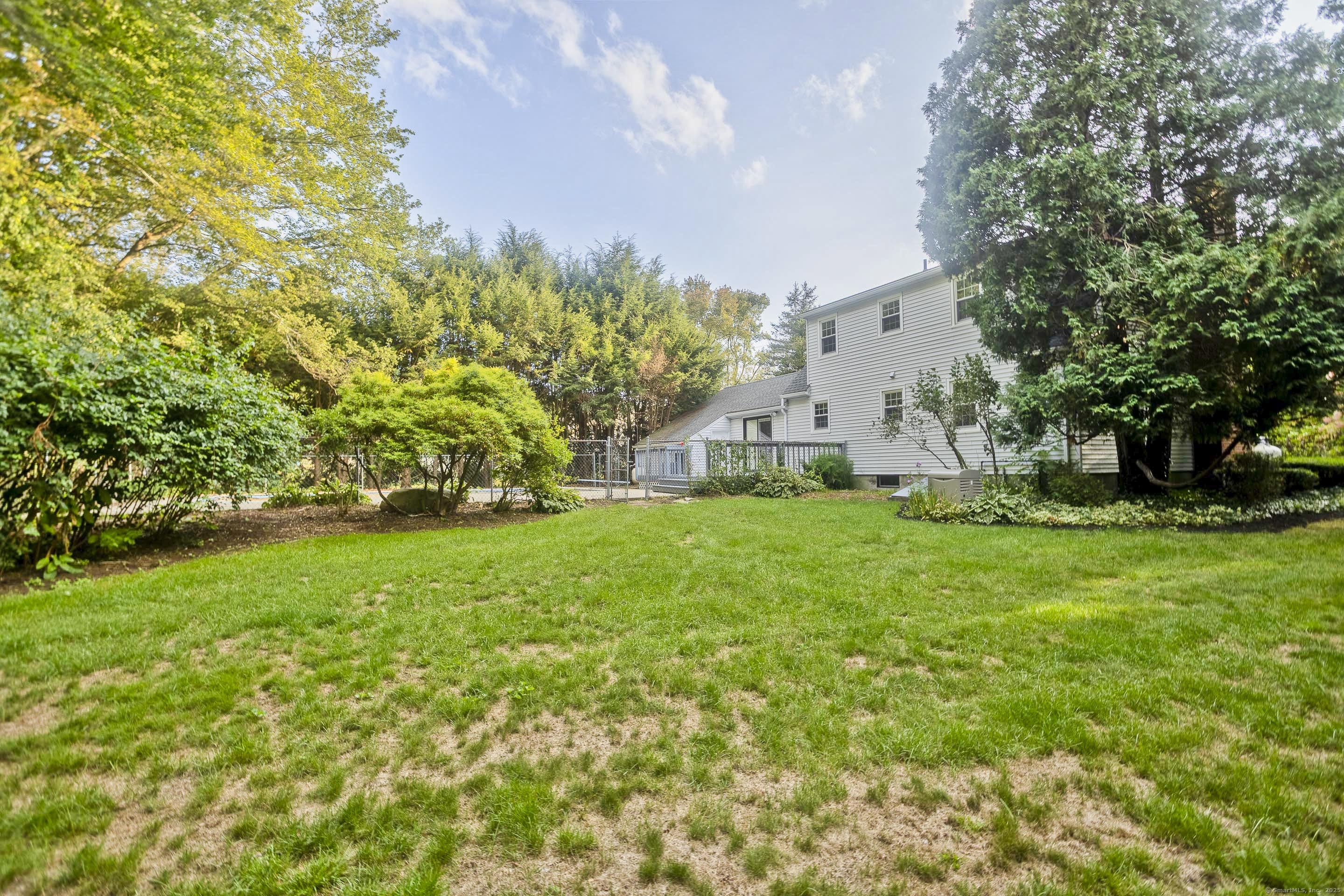 215 Sand Dam Road Thompson, CT 06277 - Photo 31 of 36 a view of a house with backyard and garden