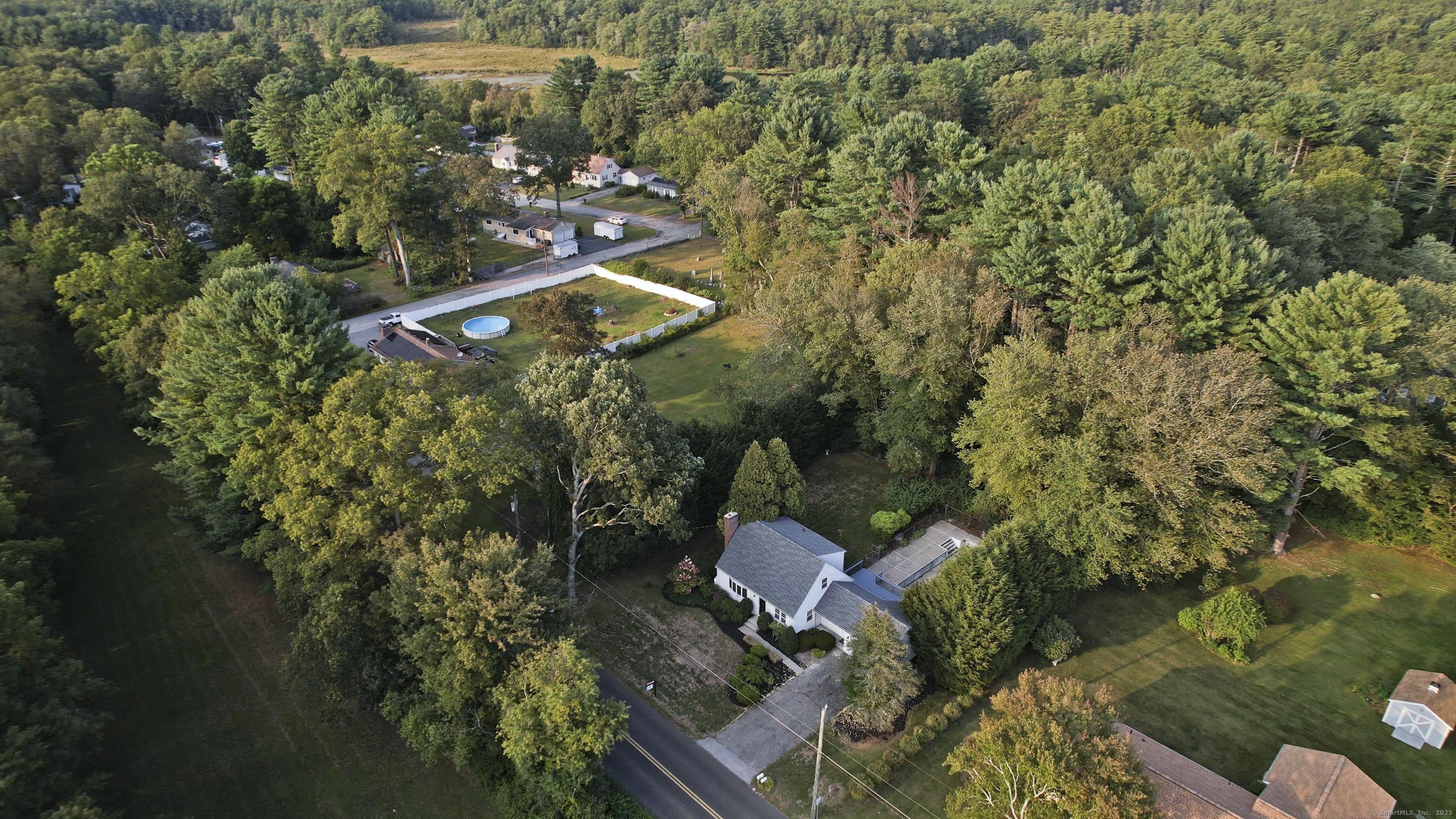 215 Sand Dam Road Thompson, CT 06277 - Photo 32 of 36 an aerial view of a house with a yard