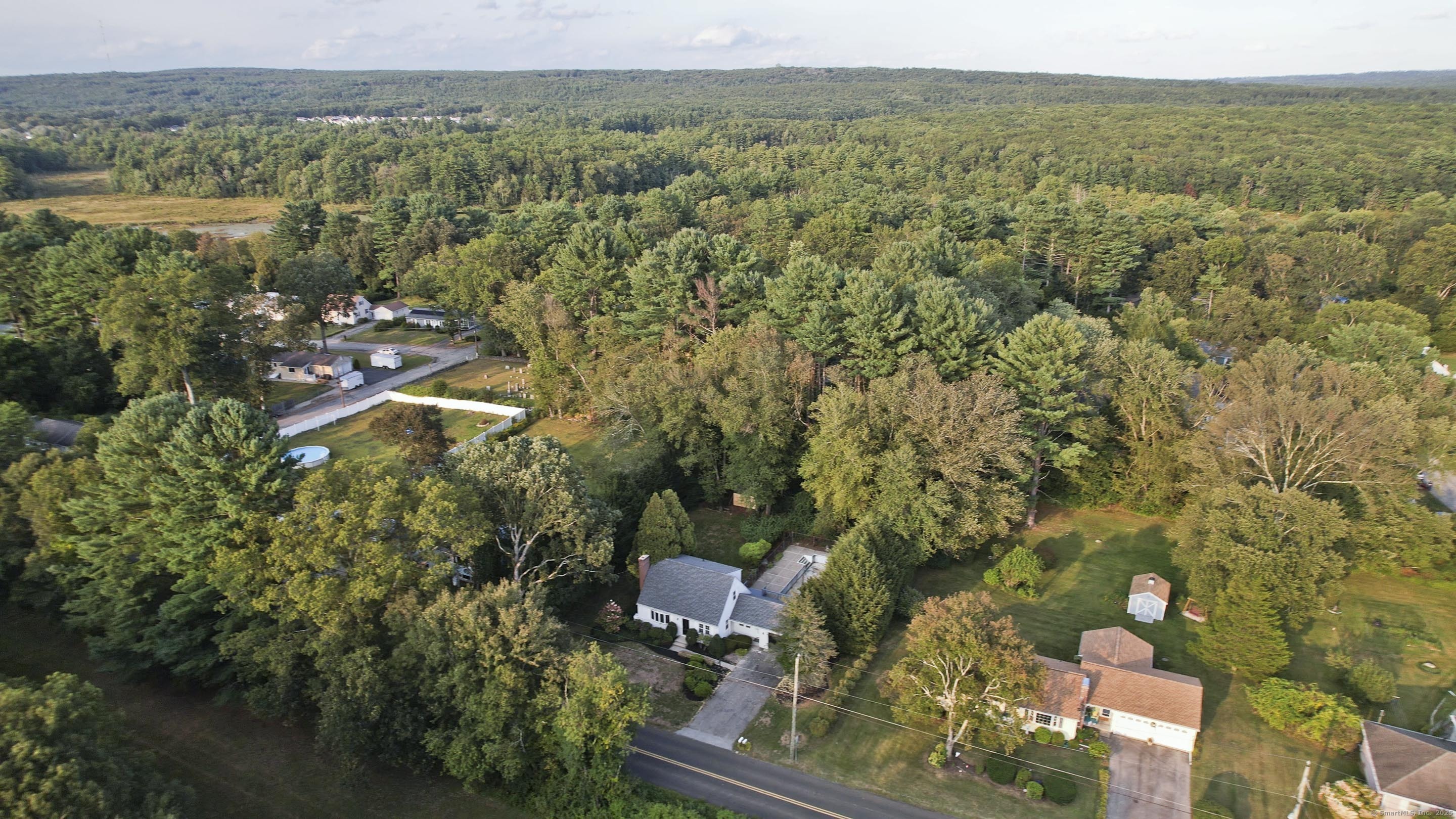 215 Sand Dam Road Thompson, CT 06277 - Photo 35 of 36 an aerial view of residential houses with outdoor space and trees