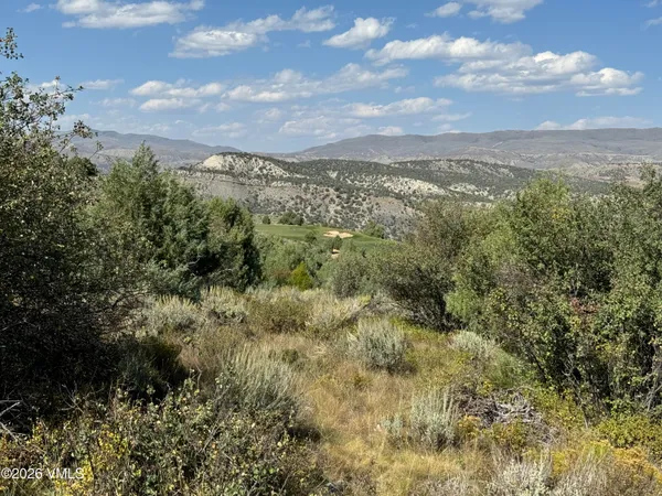 a view of a city and mountains