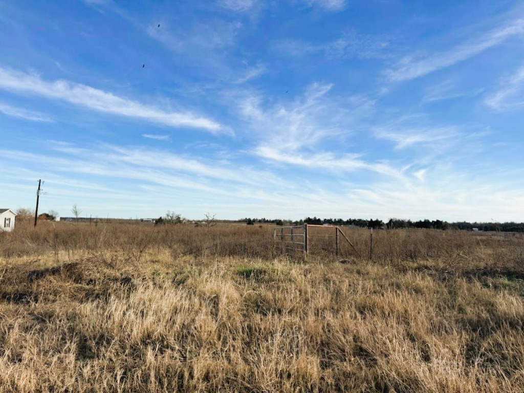 3902 County Road 270 Cameron, TX 76520 - Photo 5 of 36 a view of a lake with houses in the back