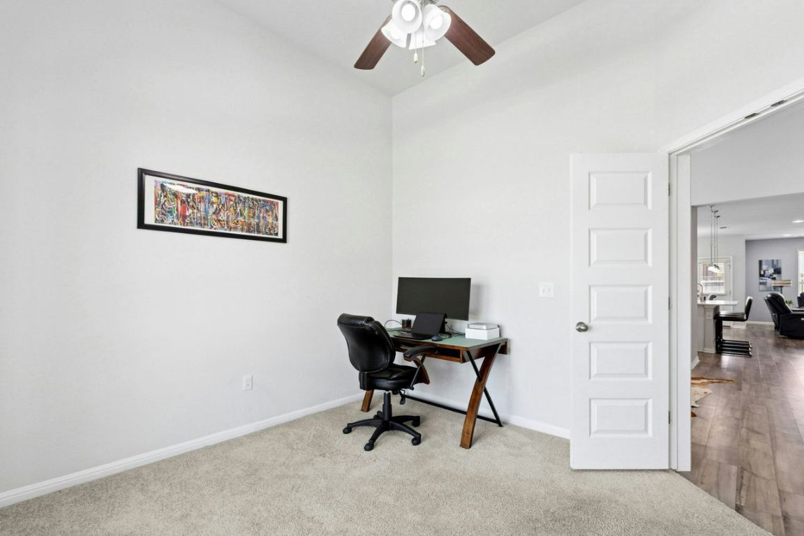 242 Backstays Loop Kyle, TX 78640 - Photo 17 of 36 Office with French doors provides privacy for work at home scenarios.