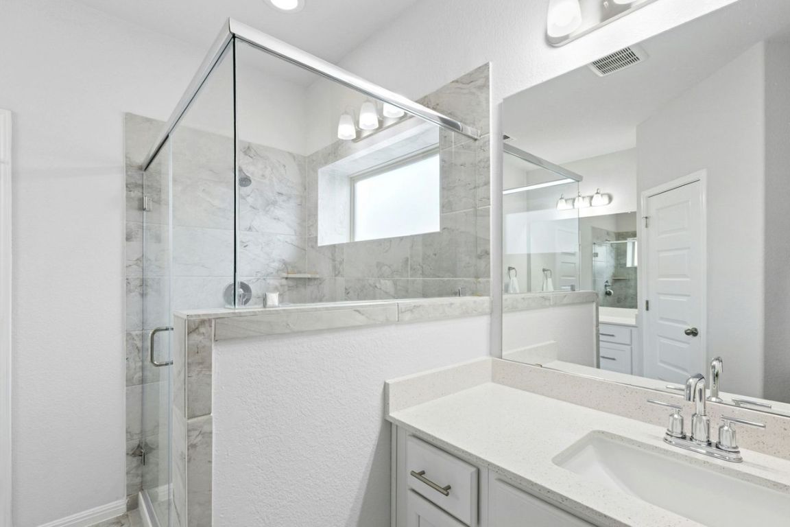 242 Backstays Loop Kyle, TX 78640 - Photo 22 of 36 Extra large shower and dual sinks.