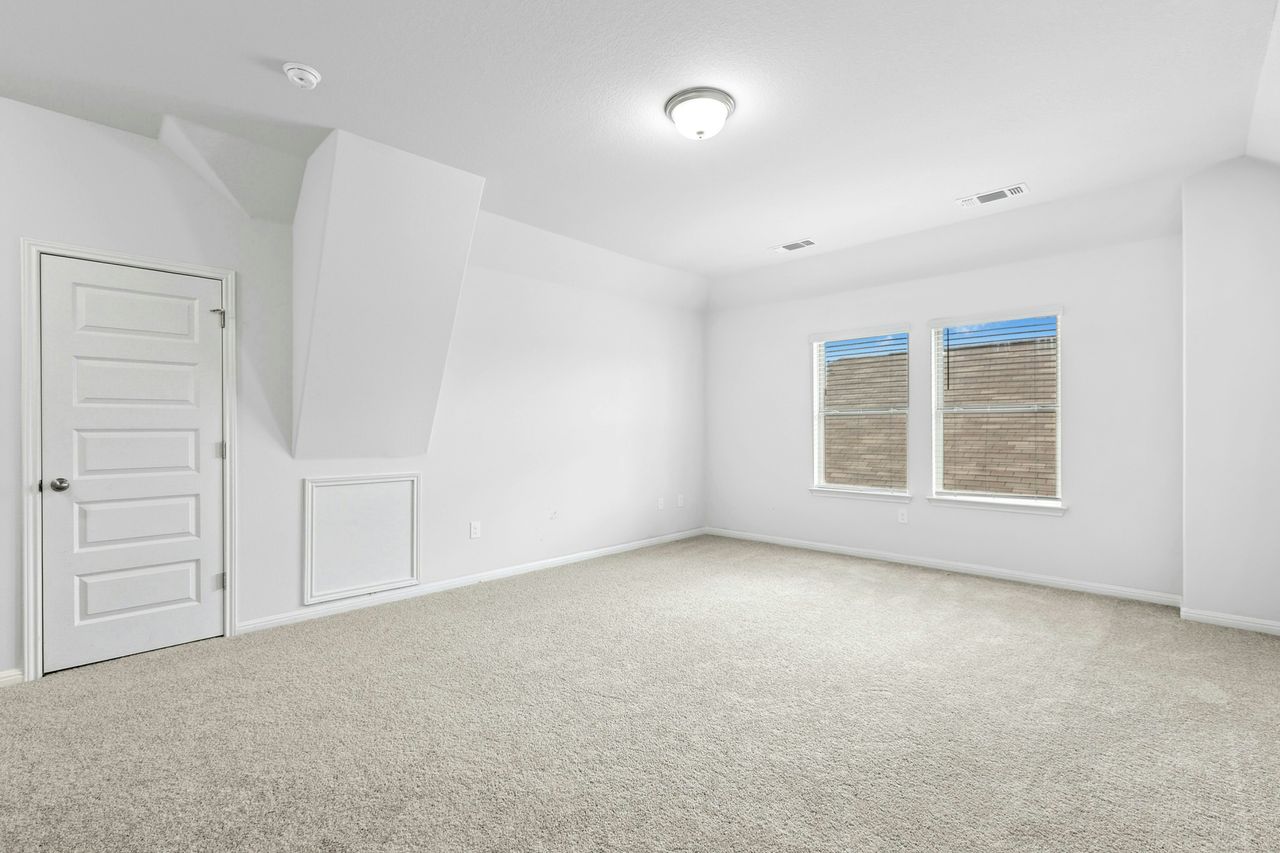 242 Backstays Loop Kyle, TX 78640 - Photo 24 of 36 an empty room with windows