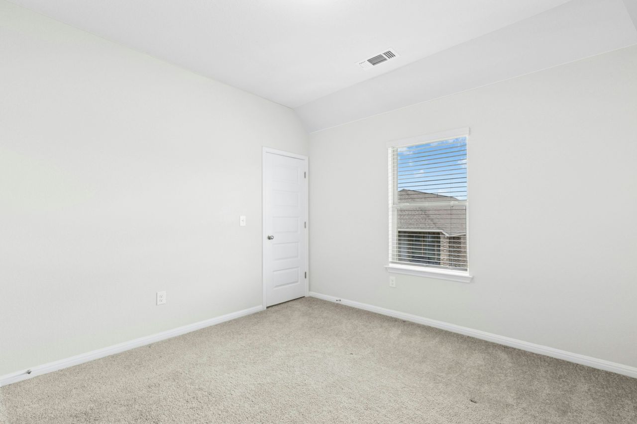 242 Backstays Loop Kyle, TX 78640 - Photo 29 of 36 an empty room with a window