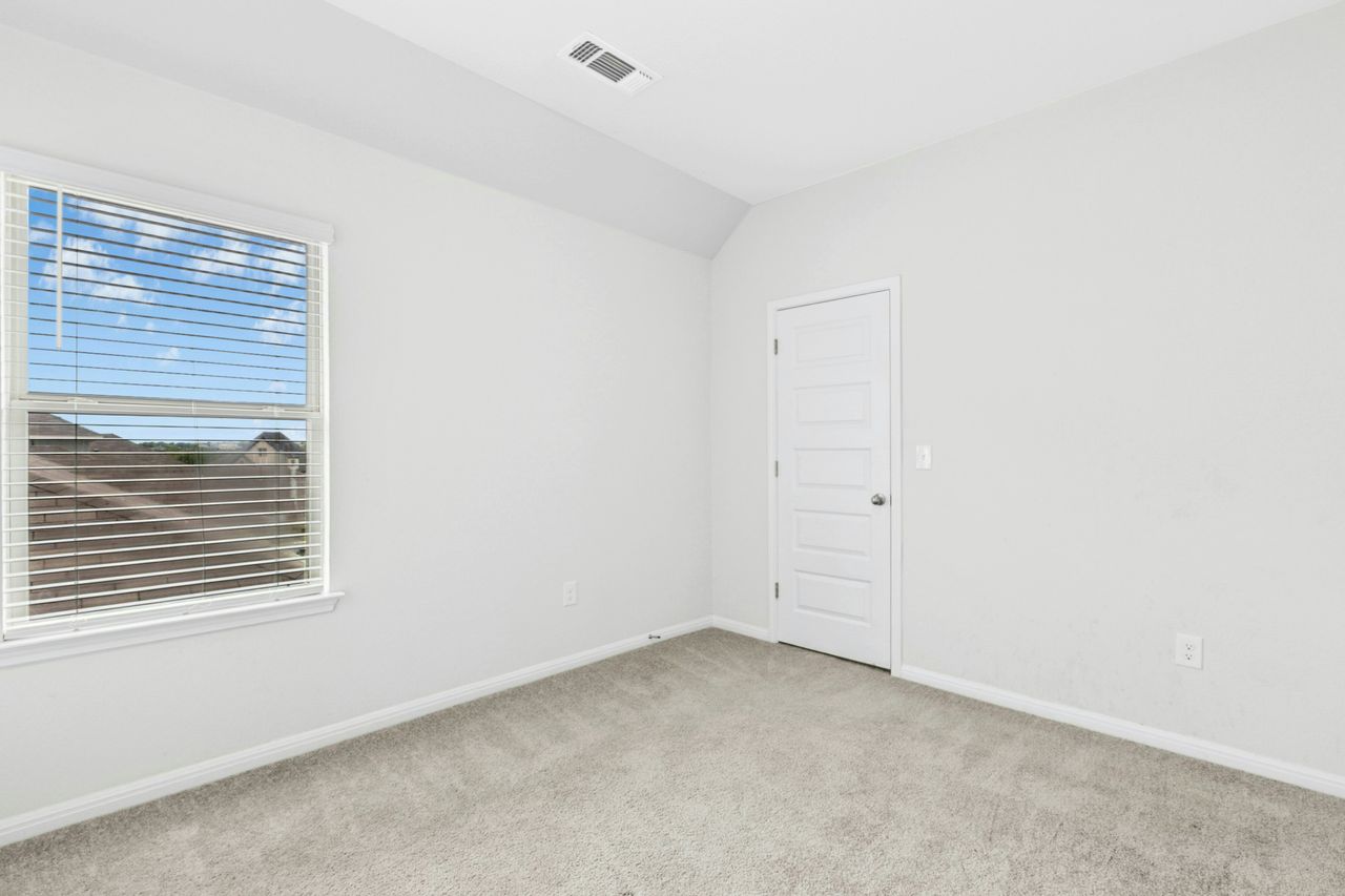 242 Backstays Loop Kyle, TX 78640 - Photo 30 of 36 a view of a room that has a window in it