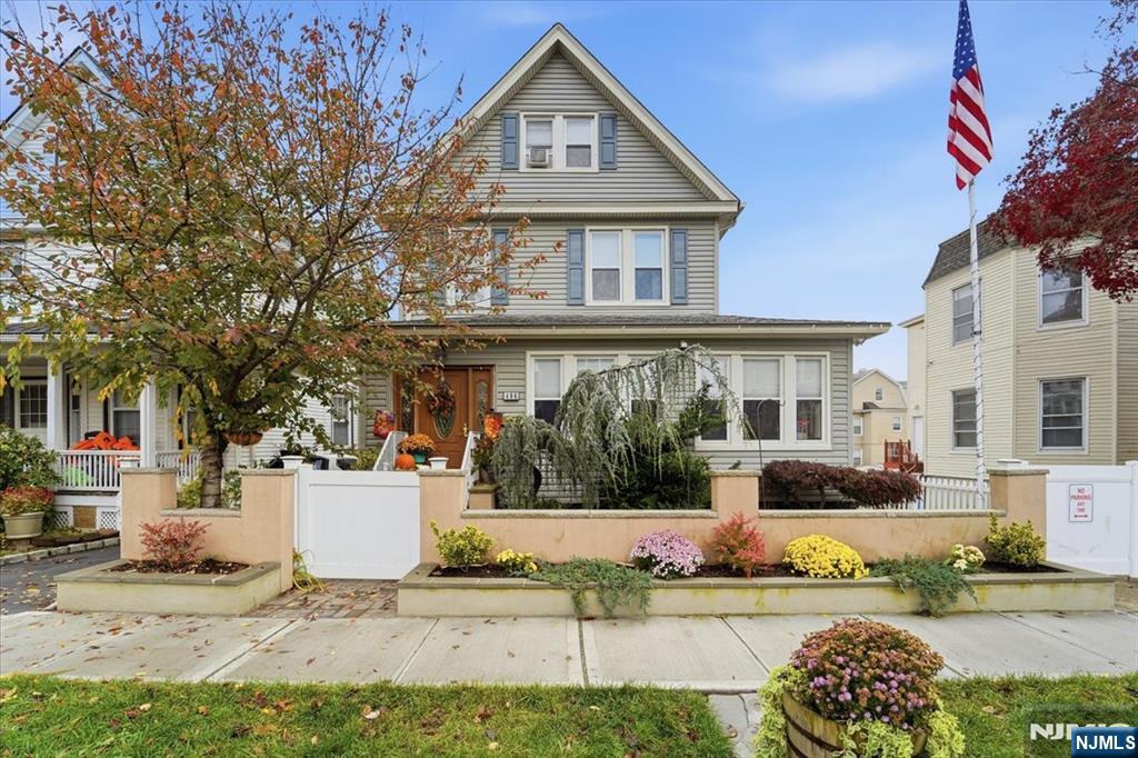 486 Devon Street Kearny, NJ 07032 - Photo 1 of 44 a front view of a house with a yard