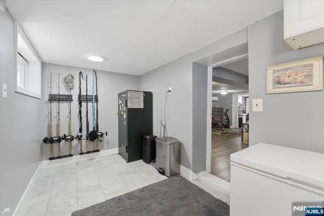 a view of a hallway with a living room