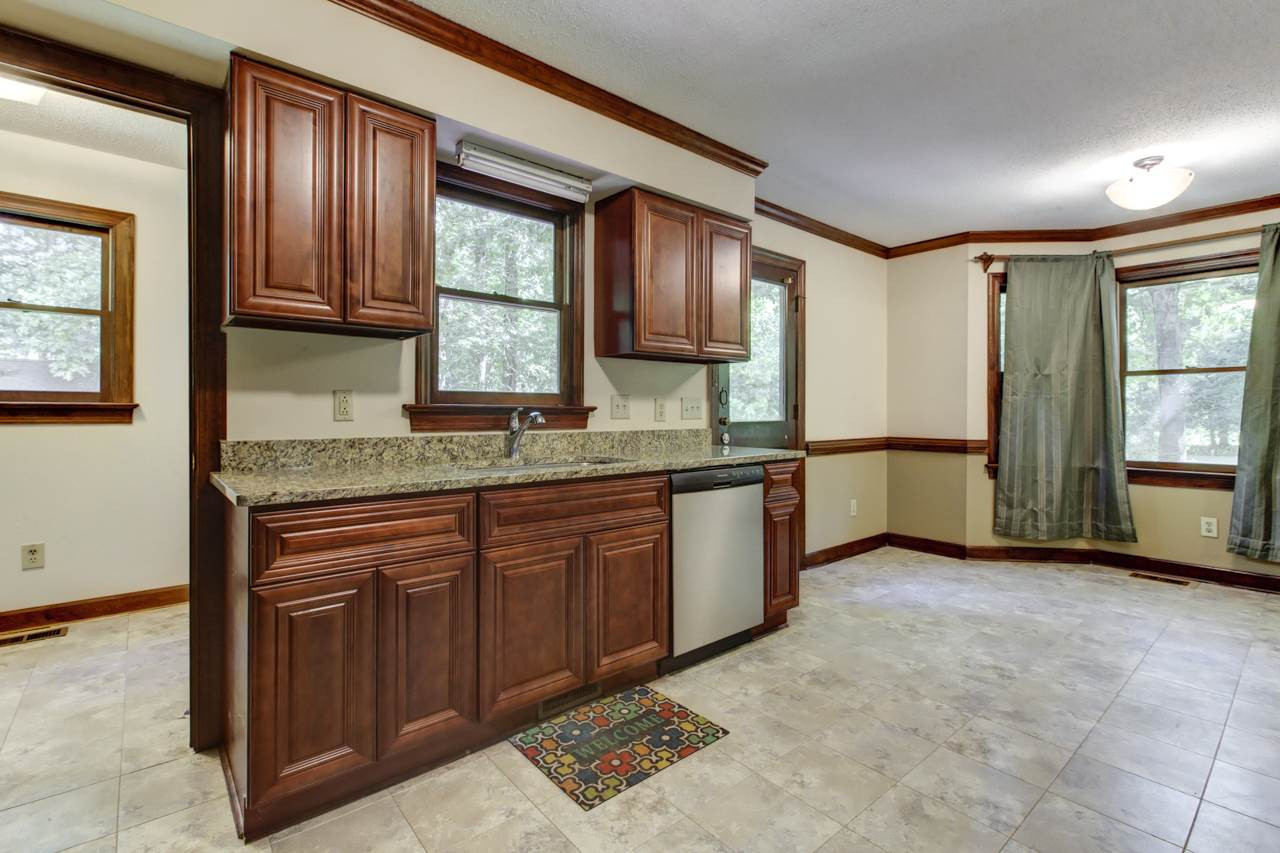 10829 Fanny Brown Road Raleigh, NC 27603 - Photo 14 of 25 Updated Kitchen has New Sink & Faucet & New Cabinets near the Sink