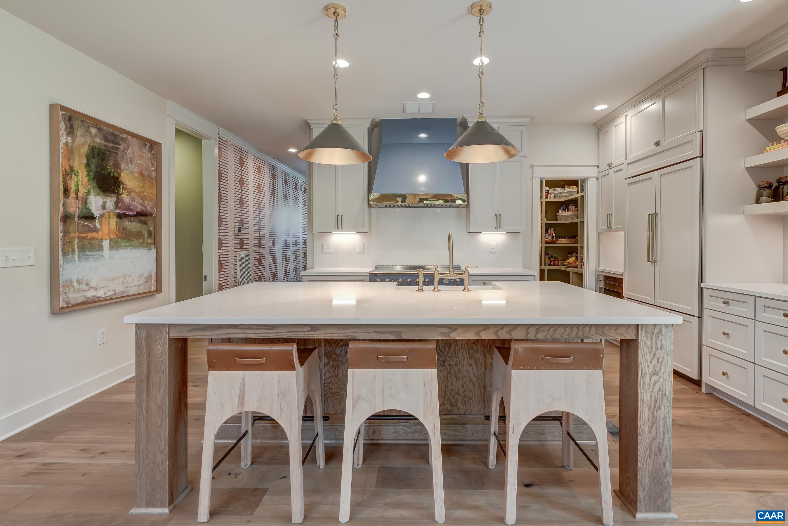 3327 Rowcross Street Crozet, VA 22932 - Photo 12 of 63 Large quartz island with seating for four.