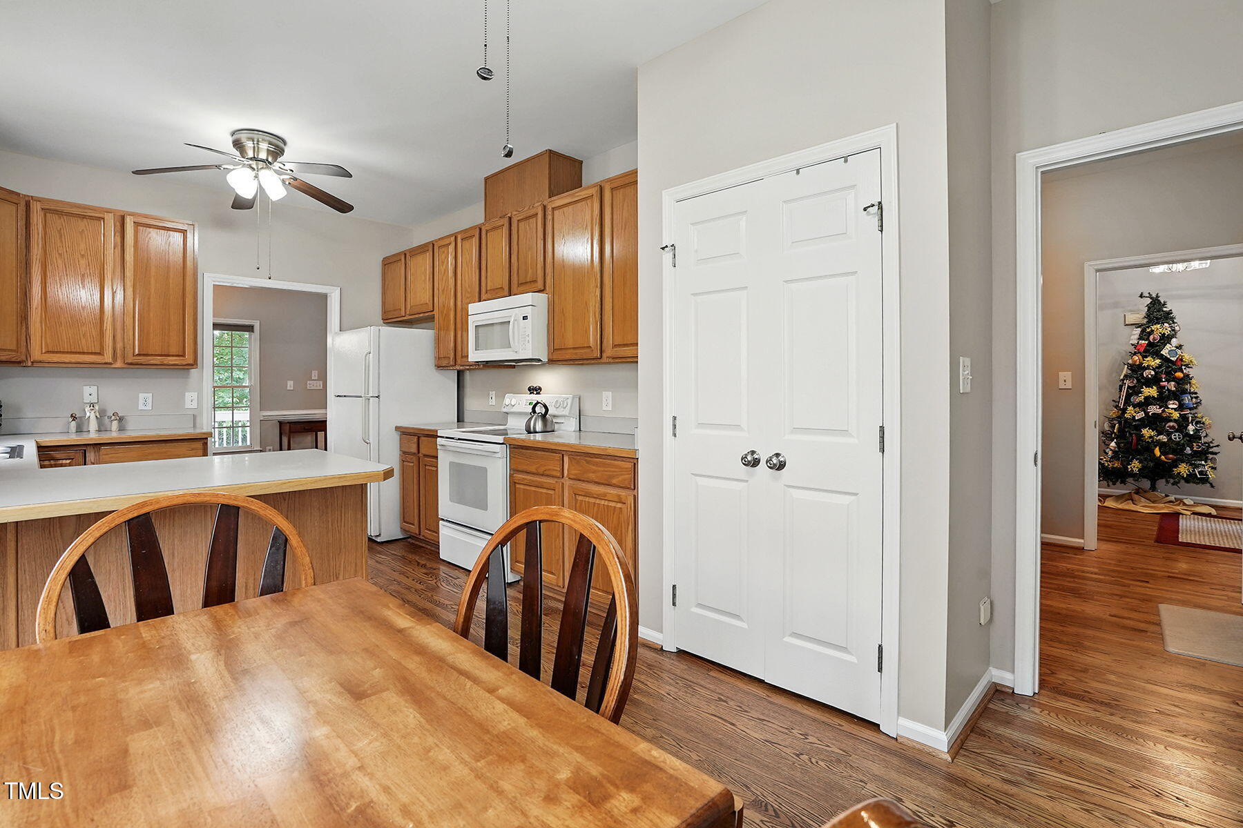 2425 Lemuel Drive Raleigh, NC 27615 - Photo 15 of 36 a kitchen with stainless steel appliances kitchen island granite countertop a refrigerator a stove top oven a sink and dishwasher