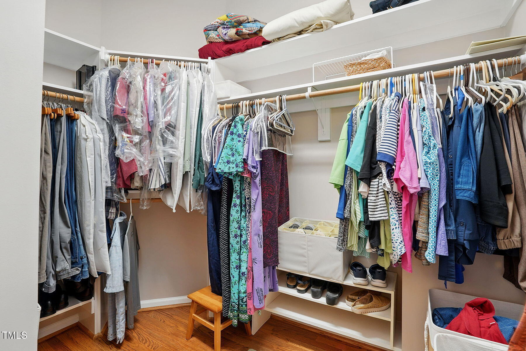 2425 Lemuel Drive Raleigh, NC 27615 - Photo 21 of 36 a view of walk in closet with clothes and shoes