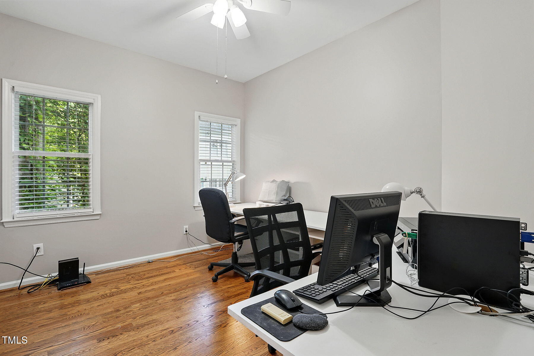 2425 Lemuel Drive Raleigh, NC 27615 - Photo 24 of 36 a view of a workspace with furniture and a window