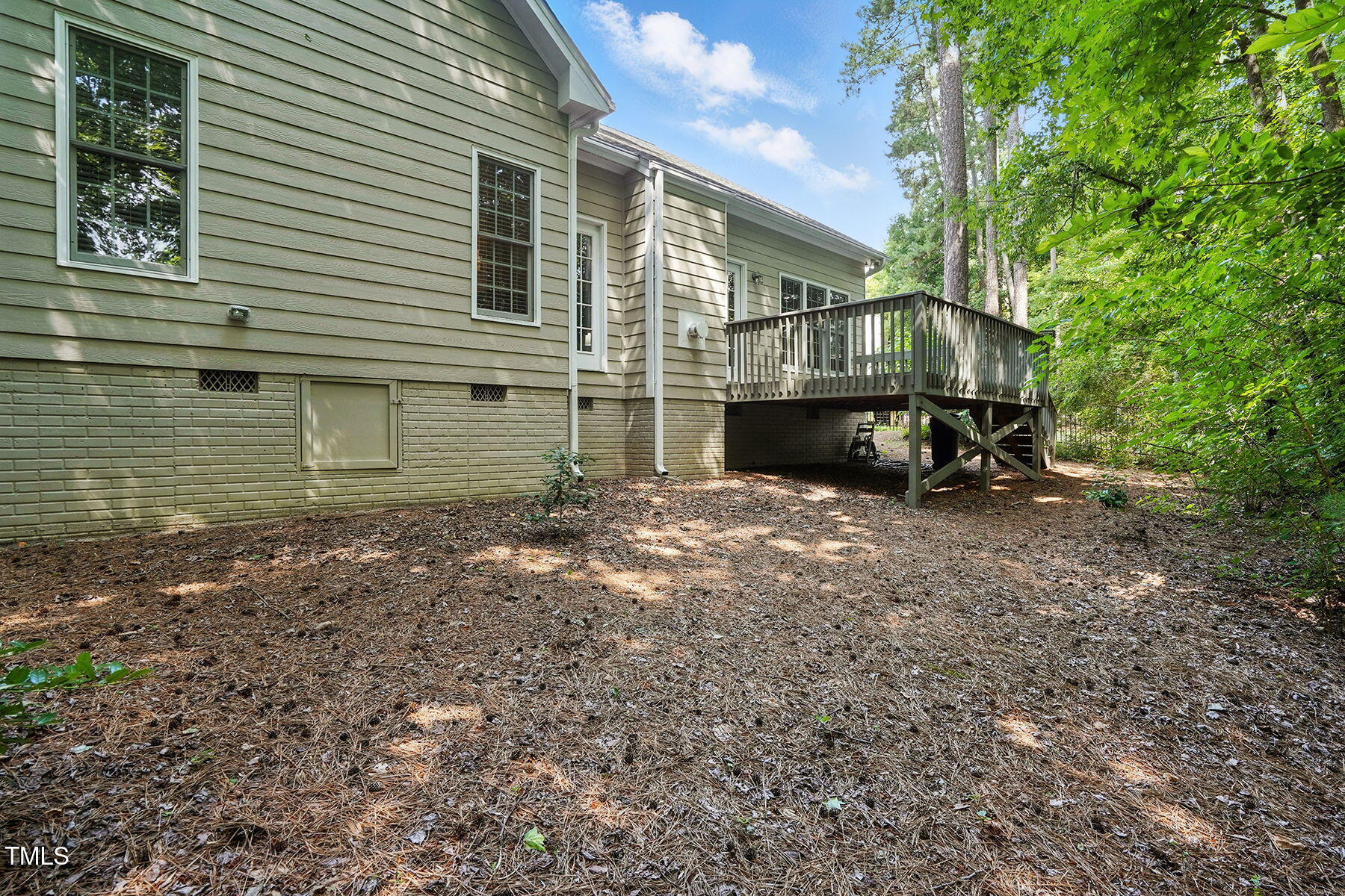 2425 Lemuel Drive Raleigh, NC 27615 - Photo 31 of 36 a view of a house with backyard and sitting area