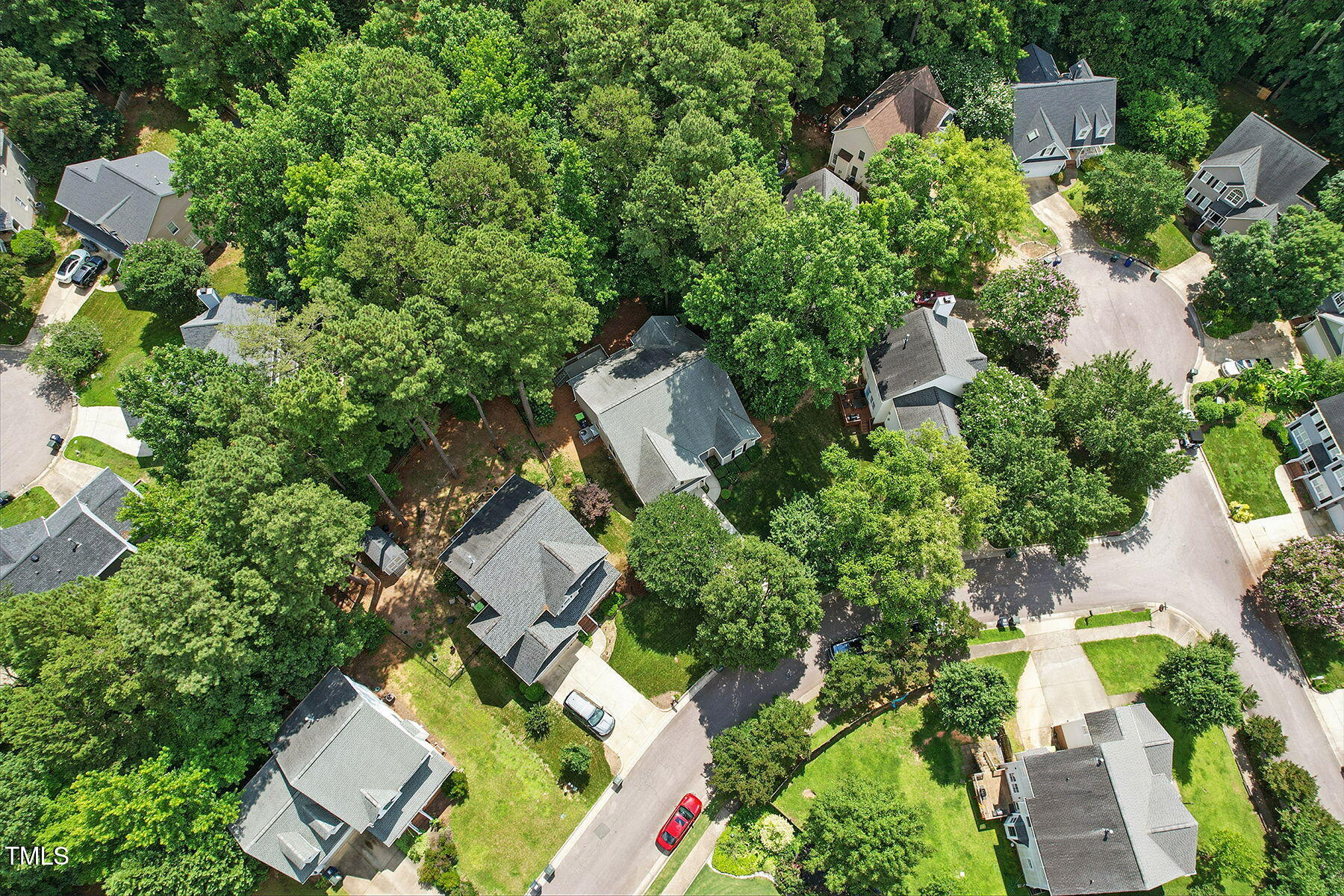 2425 Lemuel Drive Raleigh, NC 27615 - Photo 33 of 36 an aerial view of residential house with outdoor space and trees all around