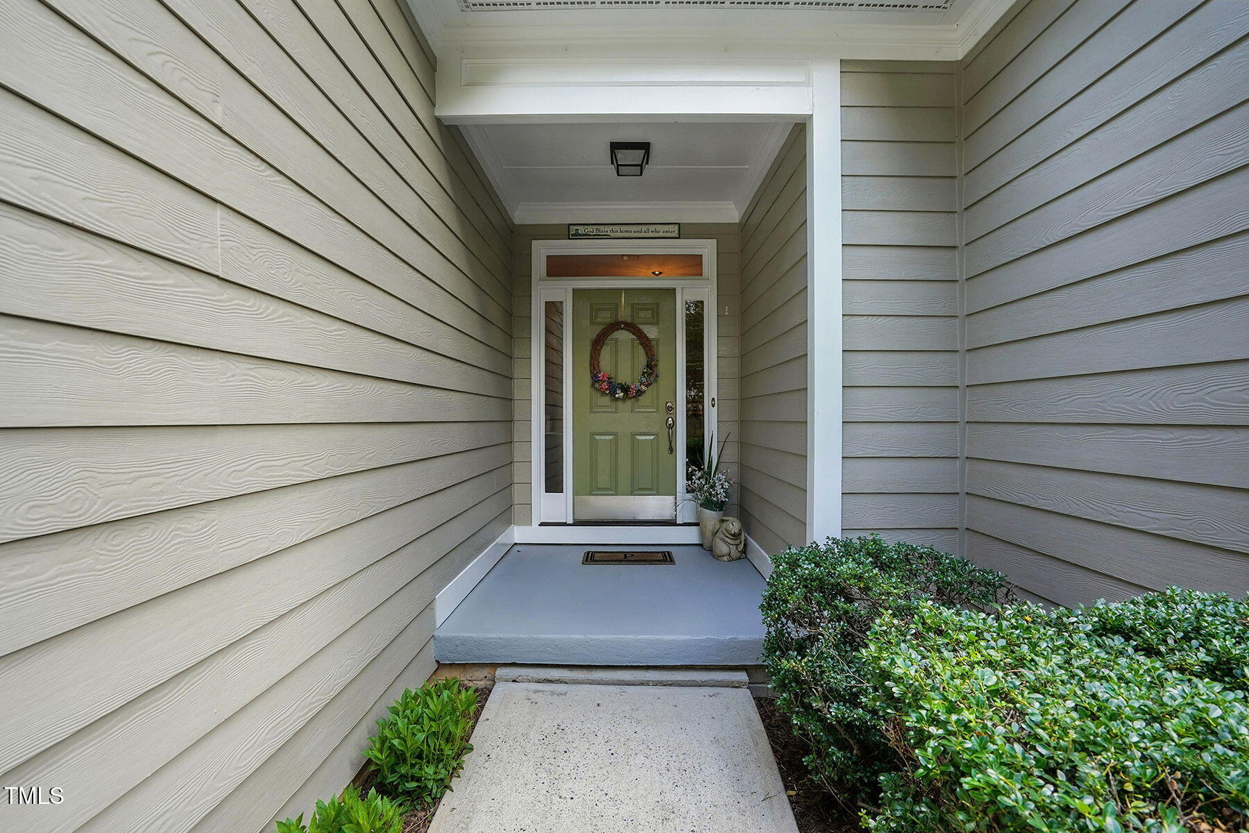 2425 Lemuel Drive Raleigh, NC 27615 - Photo 3 of 36 a front view of a house with a garden