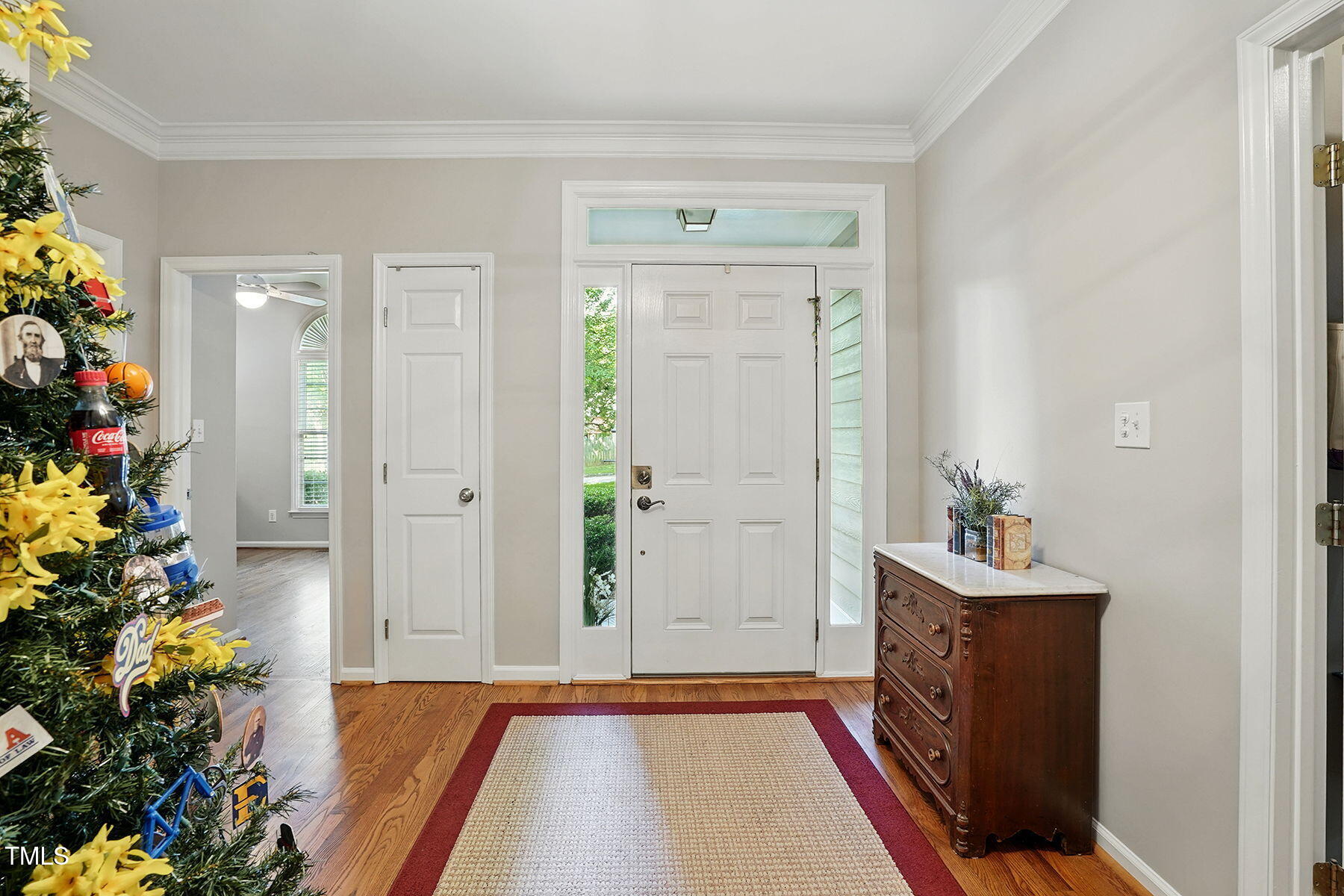 2425 Lemuel Drive Raleigh, NC 27615 - Photo 4 of 36 a view of an entryway with flower pots