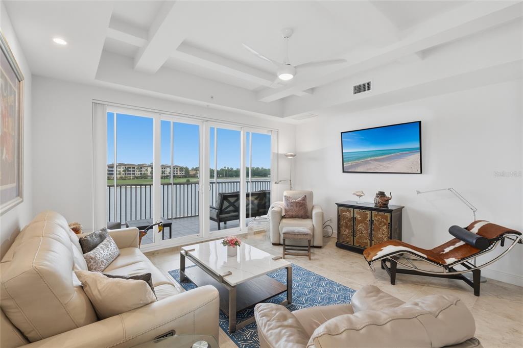 10520 Boardwalk Loop, Unit 301 Bradenton, FL 34202 - Photo 15 of 55 a living room with furniture