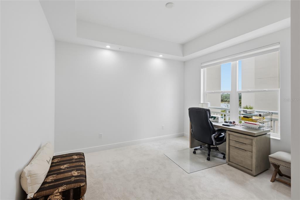 10520 Boardwalk Loop, Unit 301 Bradenton, FL 34202 - Photo 25 of 55 a view of a workspace with furniture and a window