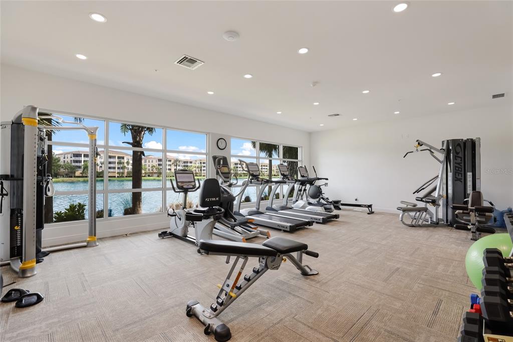 10520 Boardwalk Loop, Unit 301 Bradenton, FL 34202 - Photo 46 of 55 a view of a room with gym equipment
