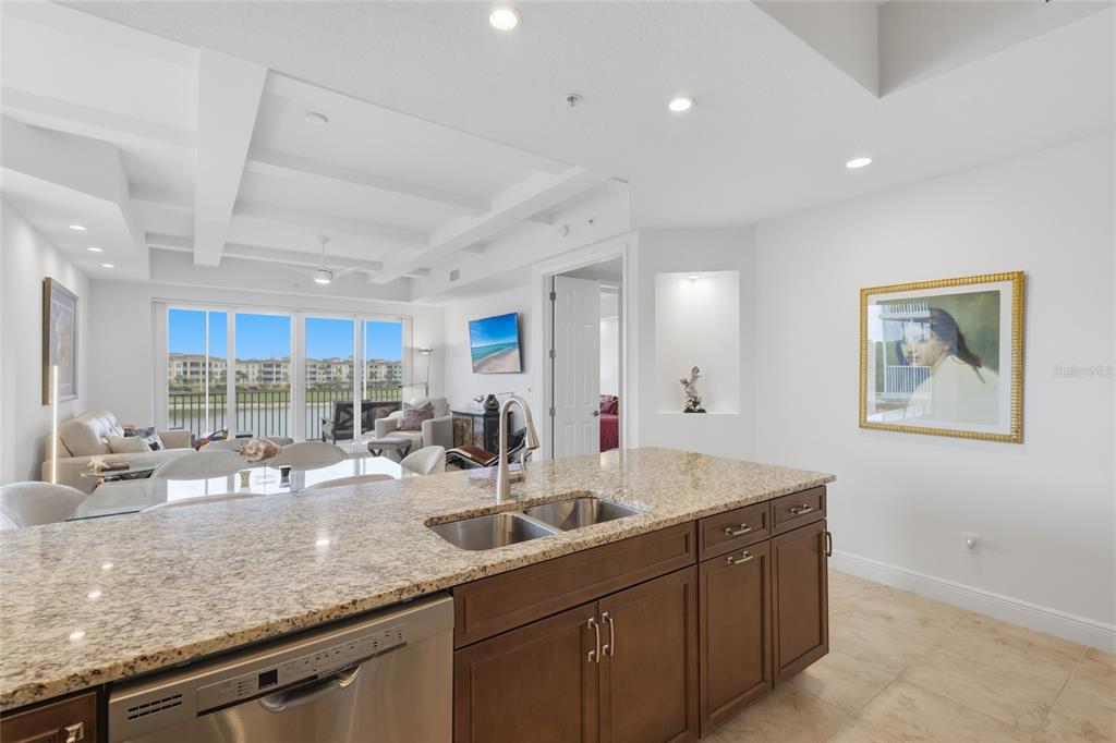 10520 Boardwalk Loop, Unit 301 Bradenton, FL 34202 - Photo 10 of 55 a kitchen with lots of counter top space