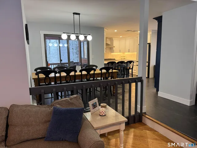 a room with furniture window and wooden floor