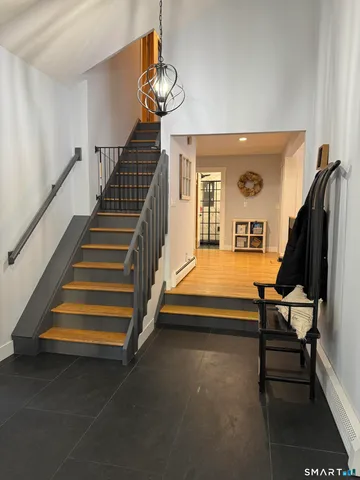 a view of livingroom with wooden floor and furniture