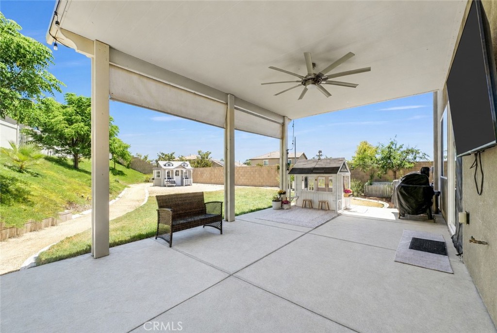 37656 Needlegrass Road Murrieta, CA 92563 - Photo 27 of 29 The alumawood patio cover is perfect for beating the heat.