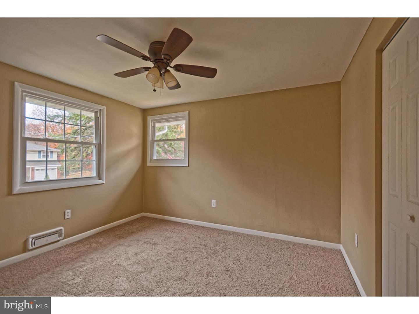 245 Winding Way Road Stratford, NJ 08084 - Photo 16 of 21 a view of an empty room with a window