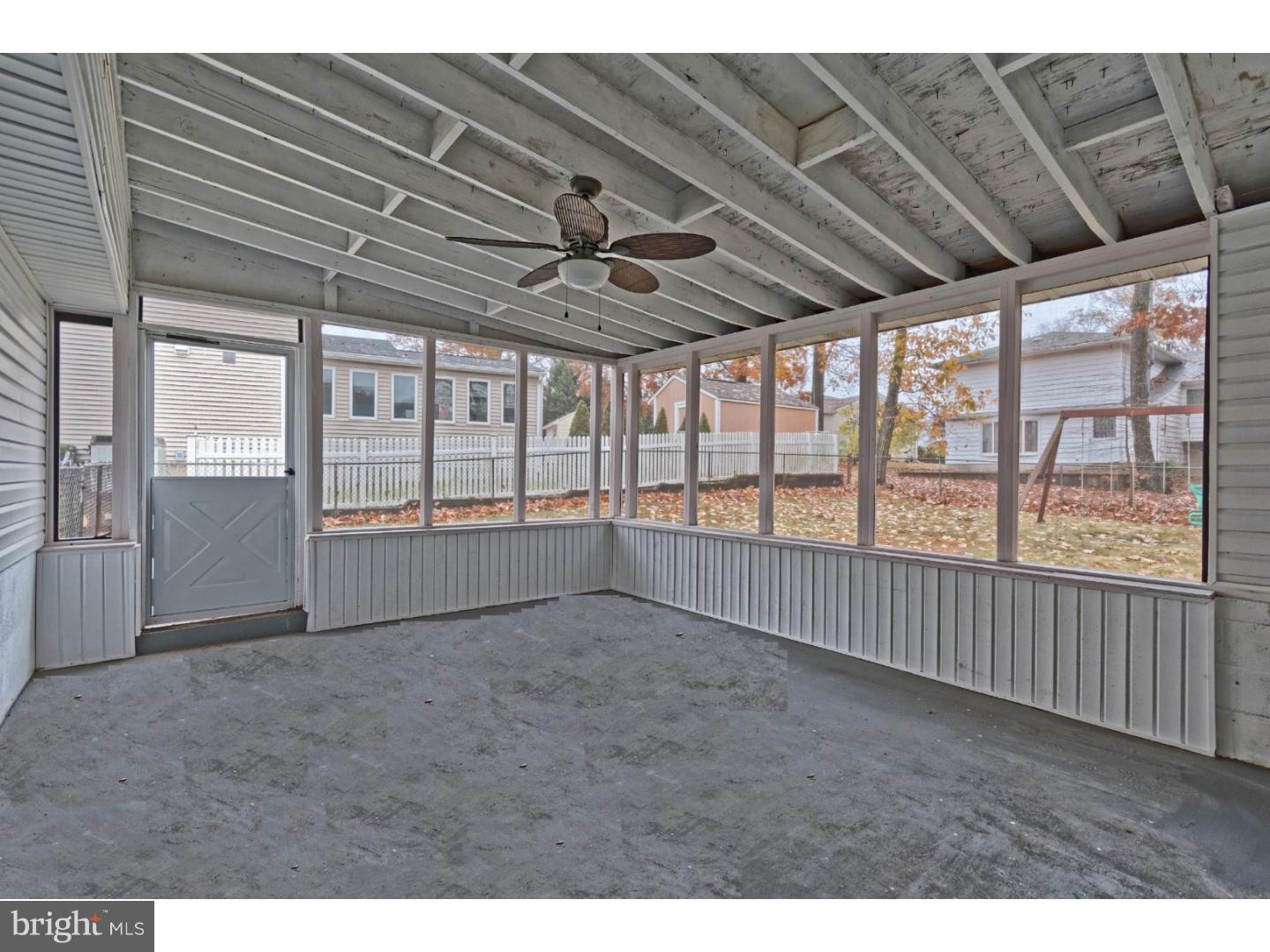 245 Winding Way Road Stratford, NJ 08084 - Photo 19 of 21 a view of an empty room with a window