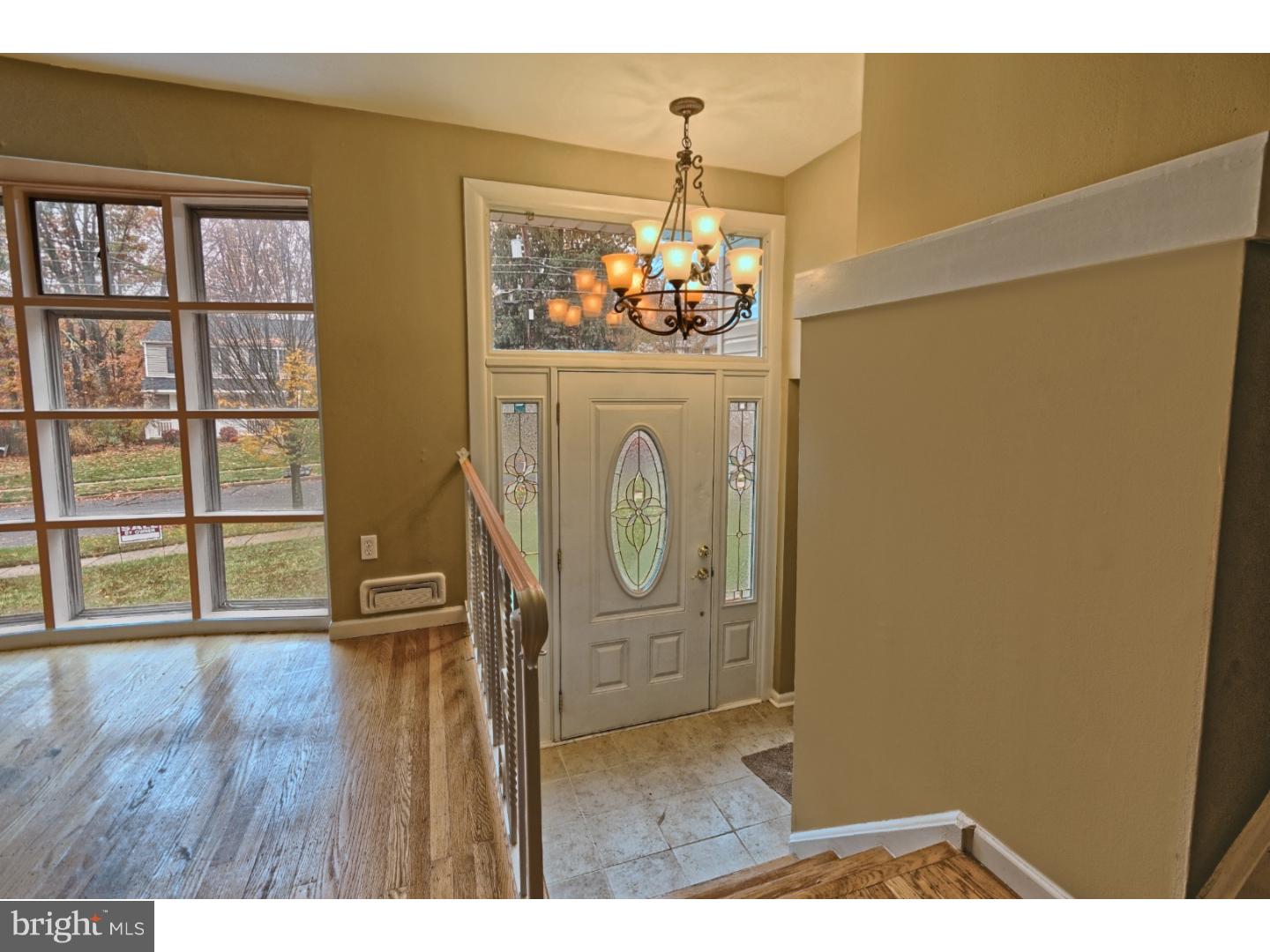 245 Winding Way Road Stratford, NJ 08084 - Photo 3 of 21 a view of livingroom with furniture wooden floor and window