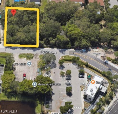 2964 Peters Avenue Naples, FL 34112 - Photo 3 of 11 a aerial view of a house with swimming pool and outdoor space
