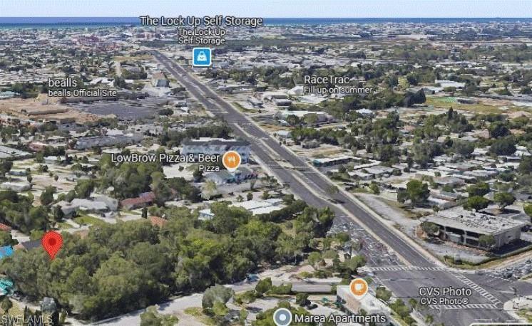 2964 Peters Avenue Naples, FL 34112 - Photo 6 of 11 an aerial view of a city