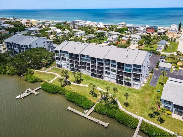 a view of a city with an ocean view