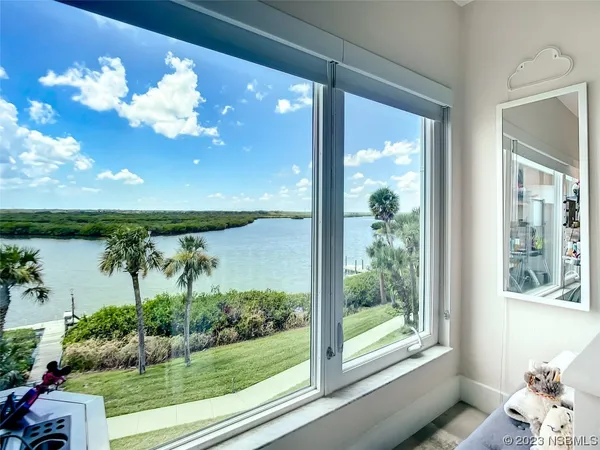 a view of a balcony with lake view