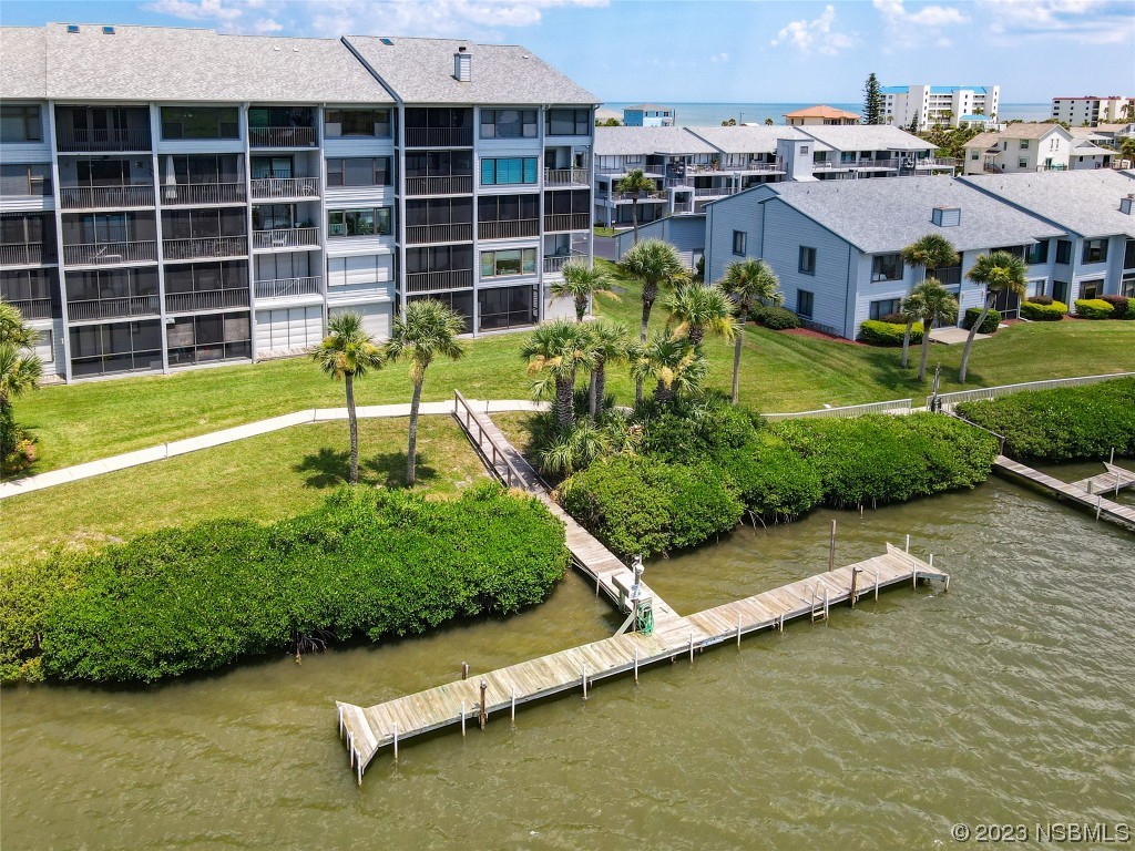 6584 Engram Road, Unit D302 New Smyrna Beach, FL 32169 - Photo 4 of 39 an aerial view of a house