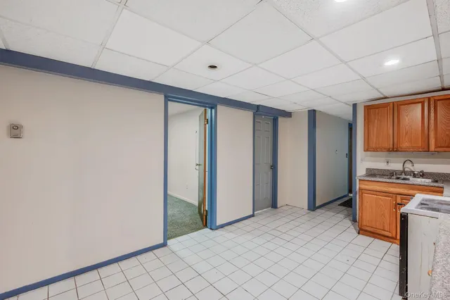 a view of a kitchen with a sink