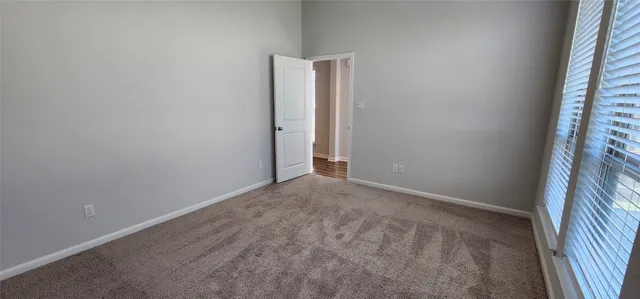 a bathroom with a double vanity sink mirror and shower