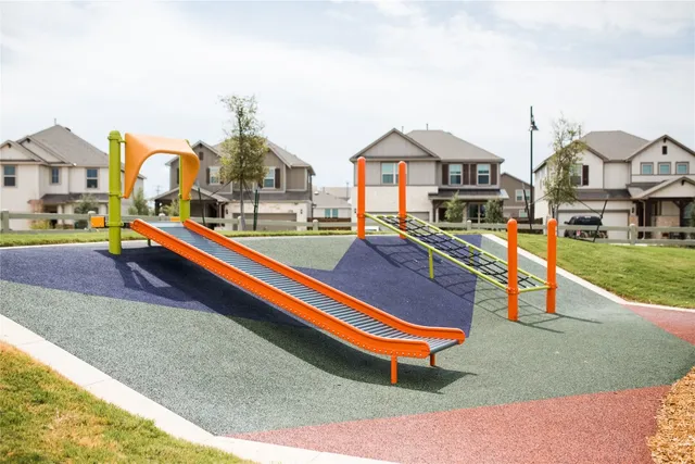 a view of a lake with a house in the background